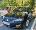 Чорний Міцубісі Lancer, об'ємом двигуна 1.6 л та пробігом 221 тис. км за 4600 $, фото 10 на Automoto.ua