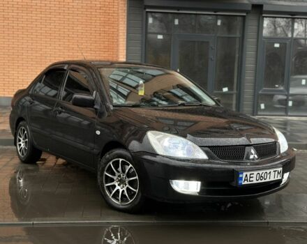 Чорний Міцубісі Lancer, об'ємом двигуна 0.16 л та пробігом 175 тис. км за 5500 $, фото 1 на Automoto.ua