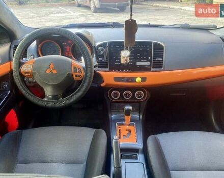 Мицубиси Лансер 2007 в Гостомель на Automoto.ua Черный Мицубиси Лансер, объемом двигателя 2 л и пробегом 258 тыс. км за 7200 $, фото 17 на Automoto.ua