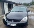Чорний Міцубісі Lancer, об'ємом двигуна 1.6 л та пробігом 245 тис. км за 4300 $, фото 1 на Automoto.ua