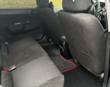 Черный Мицубиси Лансер, объемом двигателя 1.6 л и пробегом 272 тыс. км за 2800 $, фото 11 на Automoto.ua