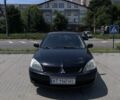 Черный Мицубиси Лансер, объемом двигателя 1.6 л и пробегом 221 тыс. км за 3399 $, фото 1 на Automoto.ua
