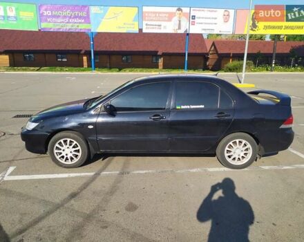 Черный Мицубиси Лансер, объемом двигателя 0 л и пробегом 160 тыс. км за 5100 $, фото 1 на Automoto.ua