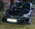 Чорний Міцубісі Lancer, об'ємом двигуна 2 л та пробігом 267 тис. км за 5108 $, фото 1 на Automoto.ua