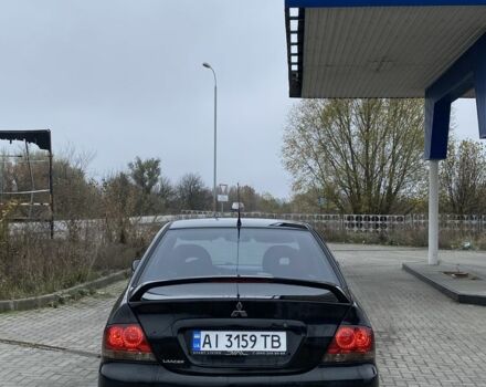 Черный Мицубиси Лансер, объемом двигателя 1.6 л и пробегом 263 тыс. км за 2900 $, фото 5 на Automoto.ua