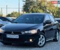 Черный Мицубиси Лансер, объемом двигателя 2 л и пробегом 241 тыс. км за 6200 $, фото 1 на Automoto.ua