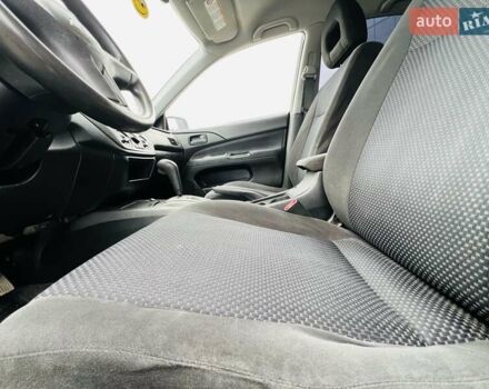 Чорний Міцубісі Lancer, об'ємом двигуна 1.6 л та пробігом 243 тис. км за 4950 $, фото 39 на Automoto.ua