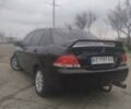 Черный Мицубиси Лансер, объемом двигателя 1.6 л и пробегом 310 тыс. км за 5700 $, фото 8 на Automoto.ua