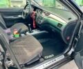 Чорний Міцубісі Lancer, об'ємом двигуна 1.6 л та пробігом 228 тис. км за 3499 $, фото 6 на Automoto.ua