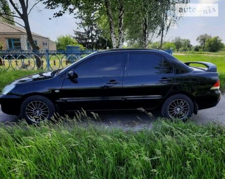 Чорний Міцубісі Lancer, об'ємом двигуна 1.6 л та пробігом 300 тис. км за 5300 $, фото 2 на Automoto.ua