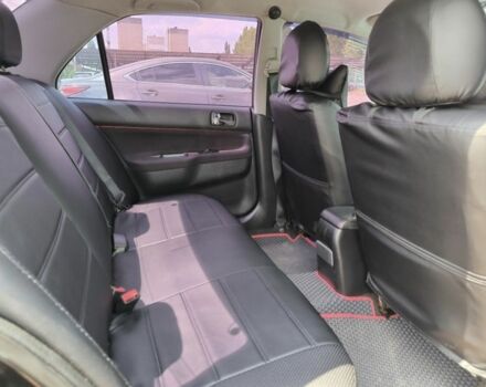 Черный Мицубиси Лансер, объемом двигателя 2 л и пробегом 161 тыс. км за 4500 $, фото 3 на Automoto.ua