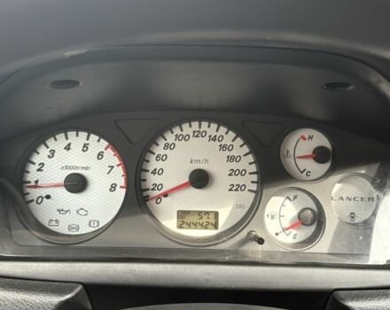 Черный Мицубиси Лансер, объемом двигателя 1.6 л и пробегом 244 тыс. км за 4500 $, фото 9 на Automoto.ua