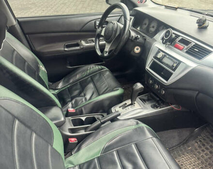 Чорний Міцубісі Lancer, об'ємом двигуна 2 л та пробігом 210 тис. км за 5500 $, фото 19 на Automoto.ua