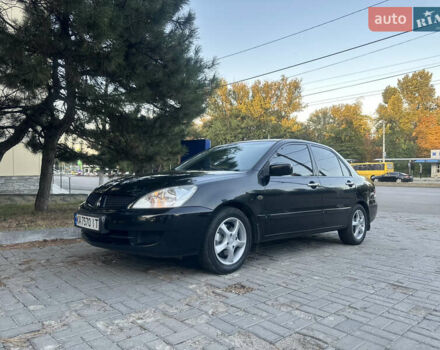 Черный Мицубиси Лансер, объемом двигателя 1.59 л и пробегом 269 тыс. км за 4999 $, фото 5 на Automoto.ua