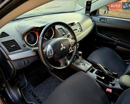 Чорний Міцубісі Lancer, об'ємом двигуна 2 л та пробігом 260 тис. км за 6555 $, фото 21 на Automoto.ua