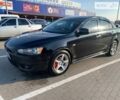 Чорний Міцубісі Lancer, об'ємом двигуна 2 л та пробігом 223 тис. км за 6100 $, фото 1 на Automoto.ua