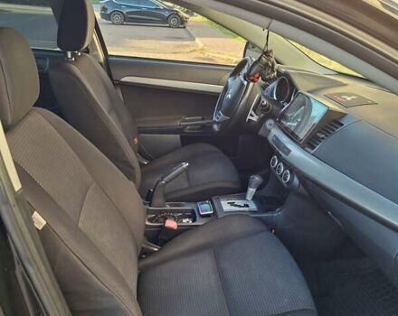 Мицубиси Лансер 2007 в Ужгороде на Automoto.ua Черный Мицубиси Лансер, объемом двигателя 2 л и пробегом 256 тыс. км за 7200 $, фото 5 на Automoto.ua