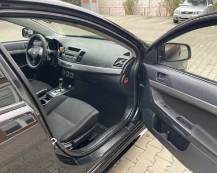 Чорний Міцубісі Lancer, об'ємом двигуна 2 л та пробігом 200 тис. км за 6800 $, фото 5 на Automoto.ua