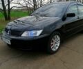 Чорний Міцубісі Lancer, об'ємом двигуна 1.6 л та пробігом 236 тис. км за 5000 $, фото 3 на Automoto.ua