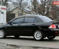 Чорний Міцубісі Lancer, об'ємом двигуна 1.6 л та пробігом 303 тис. км за 4350 $, фото 6 на Automoto.ua