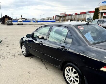 Чорний Міцубісі Lancer, об'ємом двигуна 1.6 л та пробігом 220 тис. км за 4200 $, фото 4 на Automoto.ua