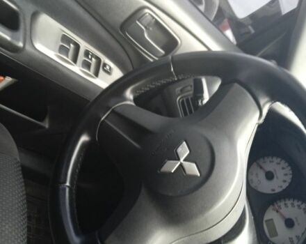 Черный Мицубиси Лансер, объемом двигателя 1.6 л и пробегом 223 тыс. км за 4300 $, фото 2 на Automoto.ua