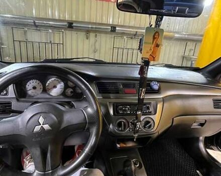 Черный Мицубиси Лансер, объемом двигателя 1.6 л и пробегом 249 тыс. км за 5000 $, фото 11 на Automoto.ua