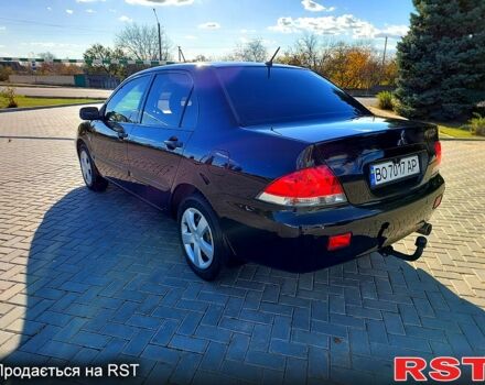 Чорний Міцубісі Lancer, об'ємом двигуна 1.6 л та пробігом 192 тис. км за 5399 $, фото 2 на Automoto.ua