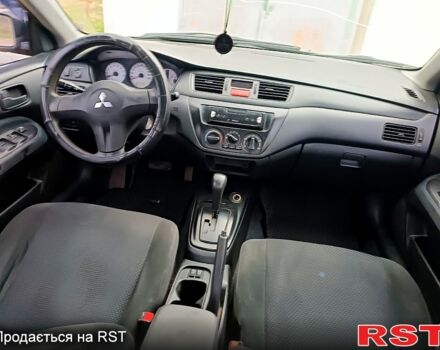 Чорний Міцубісі Lancer, об'ємом двигуна 1.6 л та пробігом 227 тис. км за 4100 $, фото 12 на Automoto.ua