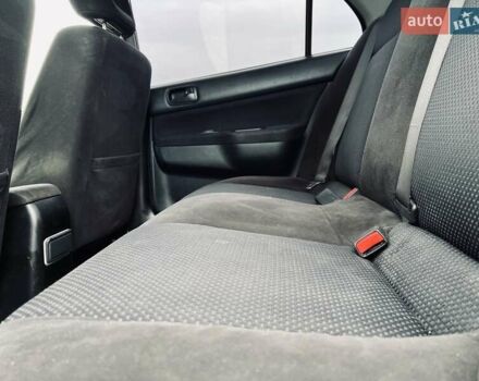 Чорний Міцубісі Lancer, об'ємом двигуна 1.6 л та пробігом 243 тис. км за 4950 $, фото 44 на Automoto.ua