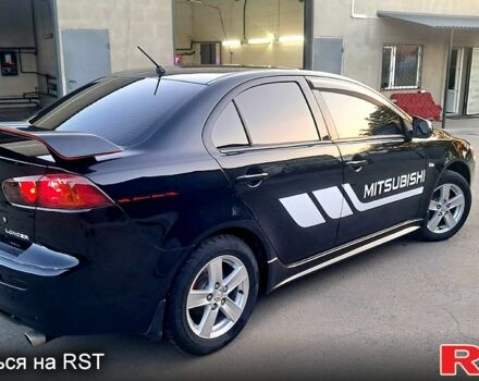 Чорний Міцубісі Lancer, об'ємом двигуна 2 л та пробігом 170 тис. км за 6800 $, фото 4 на Automoto.ua