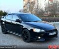 Чорний Міцубісі Lancer, об'ємом двигуна 2 л та пробігом 182 тис. км за 6700 $, фото 1 на Automoto.ua
