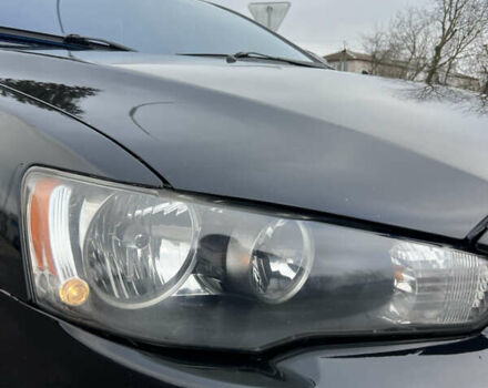 Черный Мицубиси Лансер, объемом двигателя 2 л и пробегом 350 тыс. км за 6700 $, фото 6 на Automoto.ua