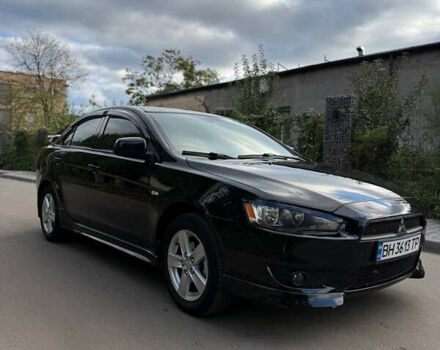 Черный Мицубиси Лансер, объемом двигателя 2 л и пробегом 219 тыс. км за 6400 $, фото 6 на Automoto.ua