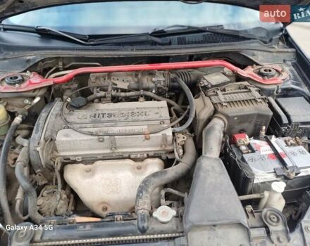 Черный Мицубиси Лансер, объемом двигателя 2 л и пробегом 286 тыс. км за 4000 $, фото 16 на Automoto.ua