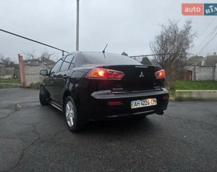 Черный Мицубиси Лансер, объемом двигателя 2 л и пробегом 116 тыс. км за 7200 $, фото 4 на Automoto.ua