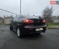 Черный Мицубиси Лансер, объемом двигателя 2 л и пробегом 116 тыс. км за 7200 $, фото 4 на Automoto.ua