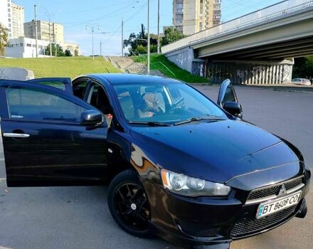 Черный Мицубиси Лансер, объемом двигателя 1.5 л и пробегом 215 тыс. км за 5600 $, фото 4 на Automoto.ua
