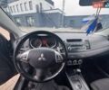 Черный Мицубиси Лансер, объемом двигателя 2 л и пробегом 259 тыс. км за 6500 $, фото 7 на Automoto.ua