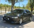 Чорний Міцубісі Lancer, об'ємом двигуна 1.5 л та пробігом 207 тис. км за 6400 $, фото 1 на Automoto.ua