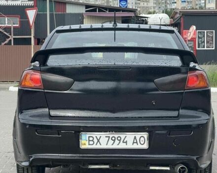 Черный Мицубиси Лансер, объемом двигателя 2 л и пробегом 350 тыс. км за 4299 $, фото 1 на Automoto.ua