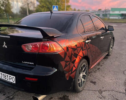 Мицубиси Лансер 2007 в Вознесенске на Automoto.ua Черный Мицубиси Лансер, объемом двигателя 2 л и пробегом 225 тыс. км за 5900 $, фото 8 на Automoto.ua