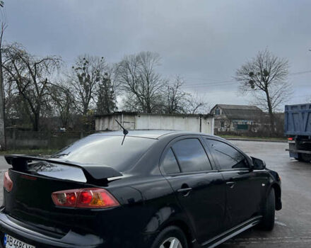 Черный Мицубиси Лансер, объемом двигателя 2 л и пробегом 350 тыс. км за 6700 $, фото 2 на Automoto.ua