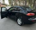 Чорний Міцубісі Lancer, об'ємом двигуна 2 л та пробігом 230 тис. км за 6800 $, фото 5 на Automoto.ua