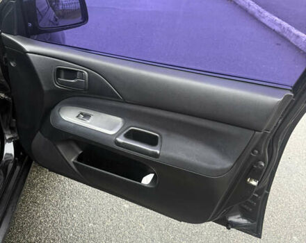 Чорний Міцубісі Lancer, об'ємом двигуна 1.58 л та пробігом 256 тис. км за 3700 $, фото 24 на Automoto.ua