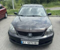 Чорний Міцубісі Lancer, об'ємом двигуна 2 л та пробігом 210 тис. км за 5500 $, фото 37 на Automoto.ua