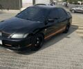 Чорний Міцубісі Lancer, об'ємом двигуна 2 л та пробігом 224 тис. км за 6000 $, фото 1 на Automoto.ua