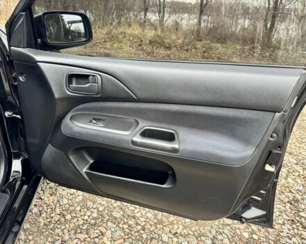 Чорний Міцубісі Lancer, об'ємом двигуна 1.6 л та пробігом 216 тис. км за 4990 $, фото 19 на Automoto.ua