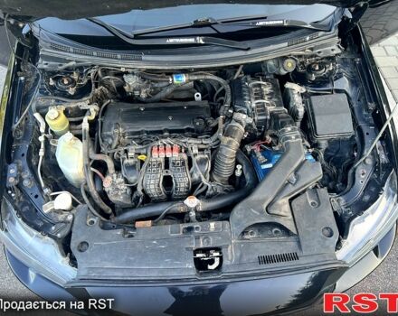 Черный Мицубиси Лансер, объемом двигателя 2 л и пробегом 216 тыс. км за 7500 $, фото 7 на Automoto.ua