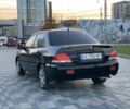 Черный Мицубиси Лансер, объемом двигателя 1.6 л и пробегом 237 тыс. км за 4300 $, фото 4 на Automoto.ua